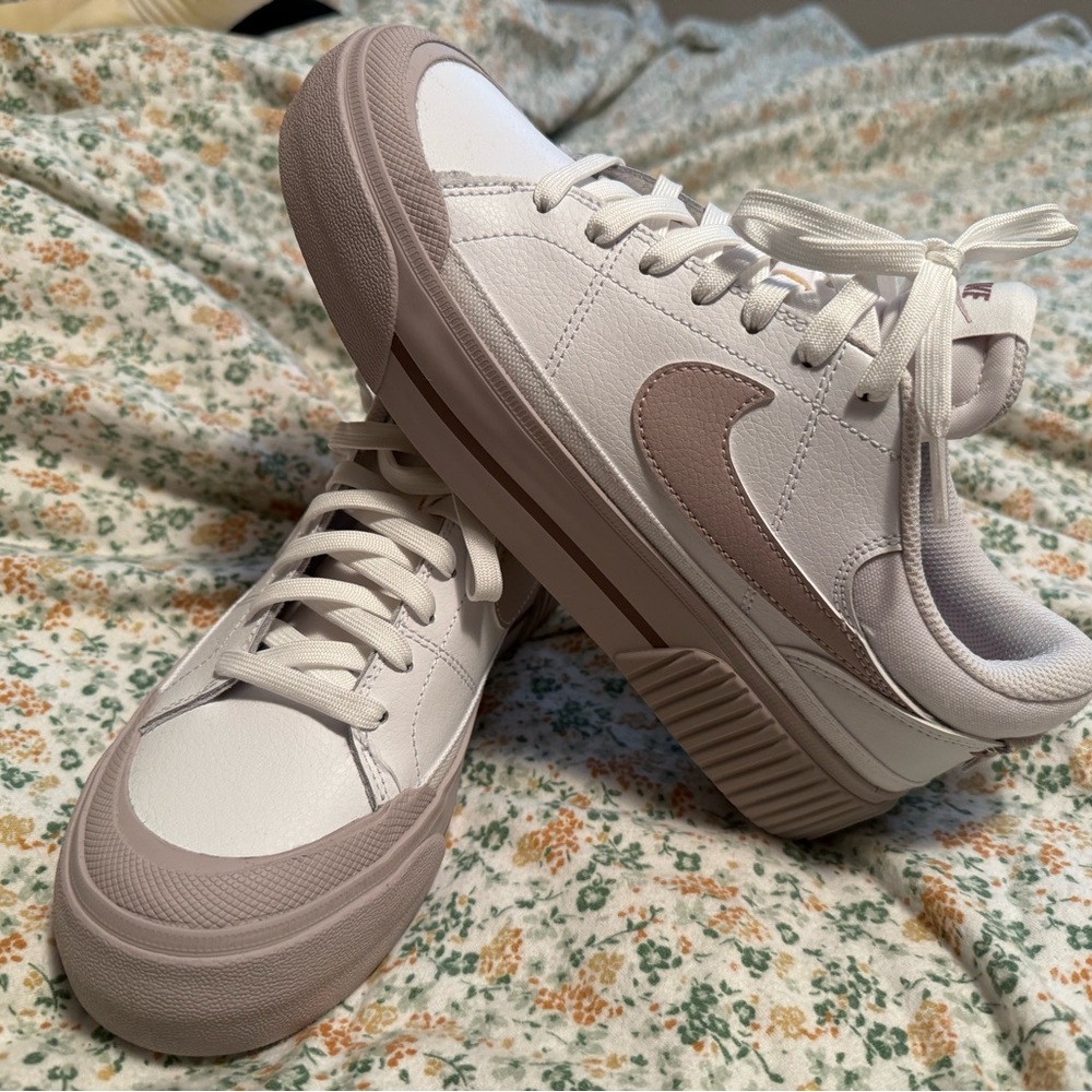 Womens platform Nikes. Never worn!